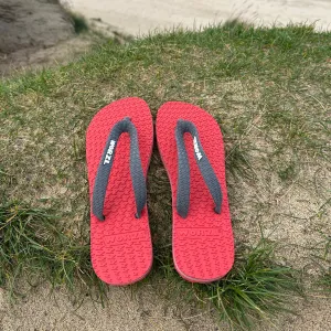 BRIGHT RED - Kids non plastic, biodegradable, rubber flip flops made in the UK.
