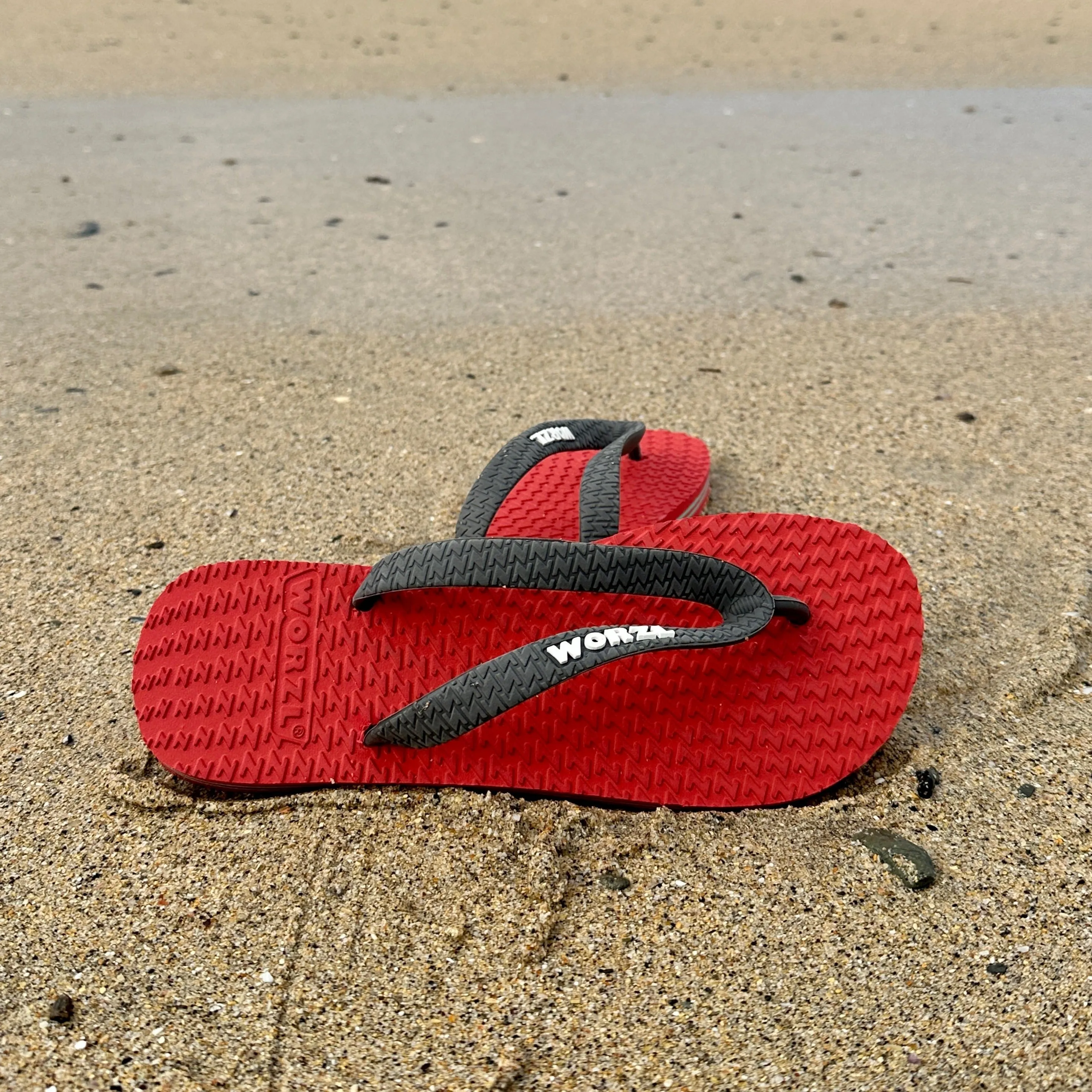 BRIGHT RED - Kids non plastic, biodegradable, rubber flip flops made in the UK.
